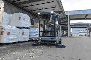 Application of Kärcher KM 210/180 R Classic Ride-On Sweeper at warehouses.